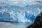 Deep blue ice blocks of the big mountain glacier