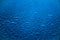 Deep blue raindrops abstract background.