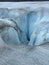 A deep crevice in a glacier