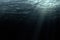 Deep dark ocean waves from underwater background