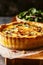 Deep dish quiche Lorraine with crispy bacon and ham, cream, eggs Swiss and Gruyere cheese filling baked in crust. Traditional