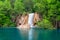 Deep forest waterfall with crystal clear water