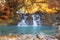 Deep forest waterfall at Sarika Waterfall World Heritage collection in autumn scene