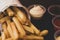 Deep French fries with several tasty sauces, deep fried Homemade Baked potato chips with several tasty sauces. Ketchup, mustard,
