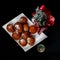 Deep fried buns oliebol and a glass of champagne is a typical Dutch tradition to celebrate new years eve in the Netherlands