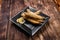 Deep-fried capelin slices of lemon black plate