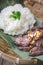 Deep fried marinated beef Thai Style on banana leaf