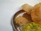 Deep fried Poori or Puri served with spicy potato onion curry and Coconut Chatney. It is an unleavened deep-fried bread