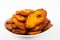 Deep fried ripe plantain slices isolated