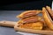 Deep fried sandwich stuffed ham cheese in wooden dish on table