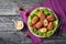 Deep fried scotch eggs on a plate