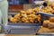 Deep fried sweet pastry, common carnival fair snack offered in stalls on markets around Christmas in Germany, selected focus