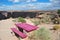 Deep Pink picnic table at the edge of 500 foot cliff