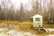 Deer blind in a clearing in a deciduous forest