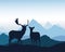 Deer and hind standing on rock in mountain landscape under blue