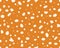 Deer skin texture seamless pattern. Perfect use for fabric, wallpaper, home decor. Vector background on brown surface.