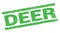 DEER text on green rectangle stamp sign