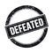 DEFEATED text on black grungy round stamp