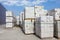 Defective aerated concrete blocks on pallets stored at warehouse