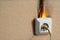 Defective wiring causes a fire. An old, worn out socket requiring replacement. The power outlet starts to light up. Burning