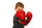 Defending little boy with boxing gloves
