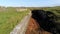 Defensive walls around Lenan Head Fort