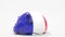 Deflating inflatable piggy bank with flag of France. French financial crisis related conceptual 3D rendering