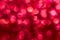 Defocured abstract red bokeh background. Nice background for Christmas or romantic project