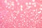 Defocus abstract show. Soft pink holiday lights. Bright background and backdrop