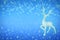 Defocus the blue background with bokeh, deer, snowflakes for Christmas and new year