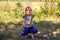 Defocus caucasian preteen girl doing physical exercise in park, forest, outdoor, outside. Healthy wellness lifestyle. Squats with