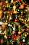 defocus. Christmas, New Year tree. background from gold, yellow, red balls. bokeh, lights