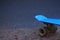 Defocus close up blue skateboard at park. Head of skateboard and wheel on road at public park. Sport concept. Blurred