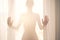 Defocus. High key light silhouette of a beautiful slender woman on the background of window