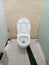Defocus Photo White Clean Toilet at public area