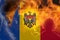 Defocus protest in Moldova. Moldova flag painted on fire flame background. Strength, Power, Protest and punch concept