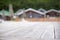 Defocus Rustic landscape wooden houses hill forest sky.