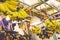 defocus shot of exotic tropical fruit, yellow banana display at market stall.