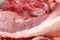 Defocus texture or background of tasty fresh meat of big, pork. Red beef meat close up texture. Meat food background