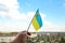 Defocus Ukraine flag. Large national symbol fluttering in blue sky. Support and help Ukraine, Independence Constitution