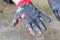 Defocus worn dirty and leaky gloves. Open palms of hands in worn workers gloves, protection against damage during