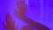 Defocused abstact silhouette of arm, hand spooky action, alien, ghost, Halloween concept, haunted and horror in multicolor