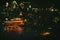 Defocused abstract city with pier, realistic miniature. Bright night urban bokeh, abstract blurred background