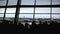 Defocused airport background, Silhouette People walking.
