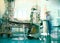 Defocused background of intensive care unit, blurred figure of medical doctor working with equipment surrounding the patient bed