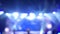 Defocused background of stage lights at the music festival