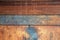 Defocused background texture of an old wood panel consisting of boards or planks for a vintage or rustic themed concept