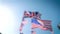Defocused blur British Union Jack and American flags of the United States