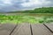 Defocused and blur image of terrace wood and lake scenery view