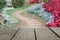 Defocused and blur image of terrace wood and pathway in the park